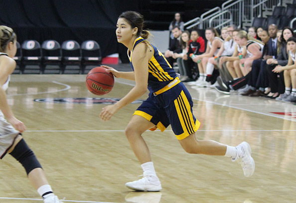 Ember Sloan (Navajo) scores 12 points for College of Saint Mary’s Flames who fall to Midland University