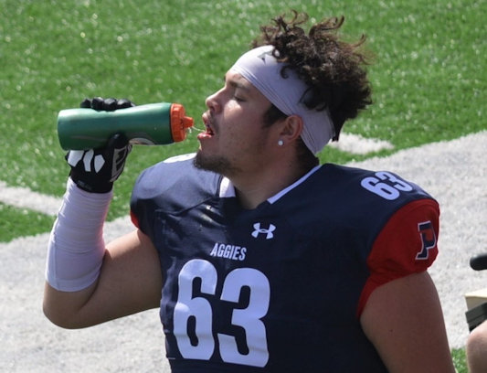 Billie Ellick (Quapaw): Resilient Offensive Lineman for the Oklahoma Panhandle State University Aggies Football Team